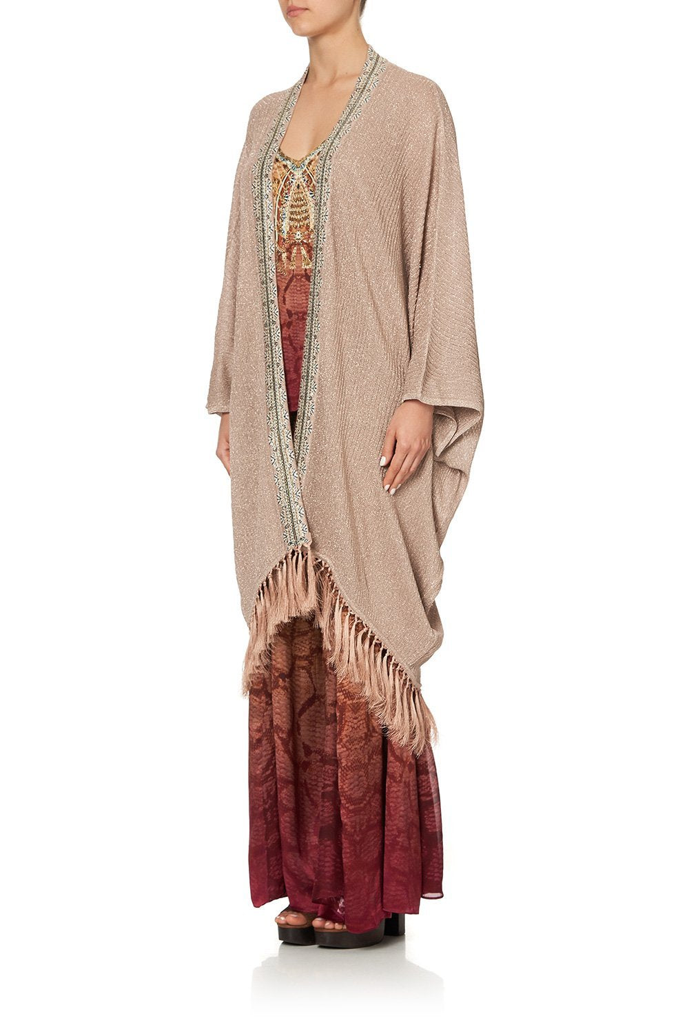 METALLIC KNIT PONCHO WITH TASSELS COASTAL TREASURE