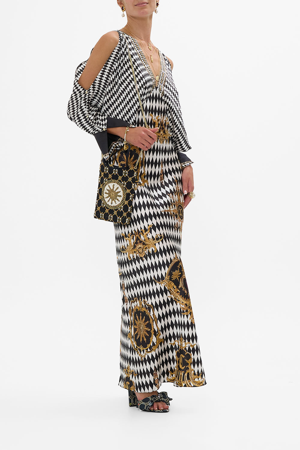 The CAMILLA SMALL CANVAS CLUTCH AROMATIC AMOR in our  print.