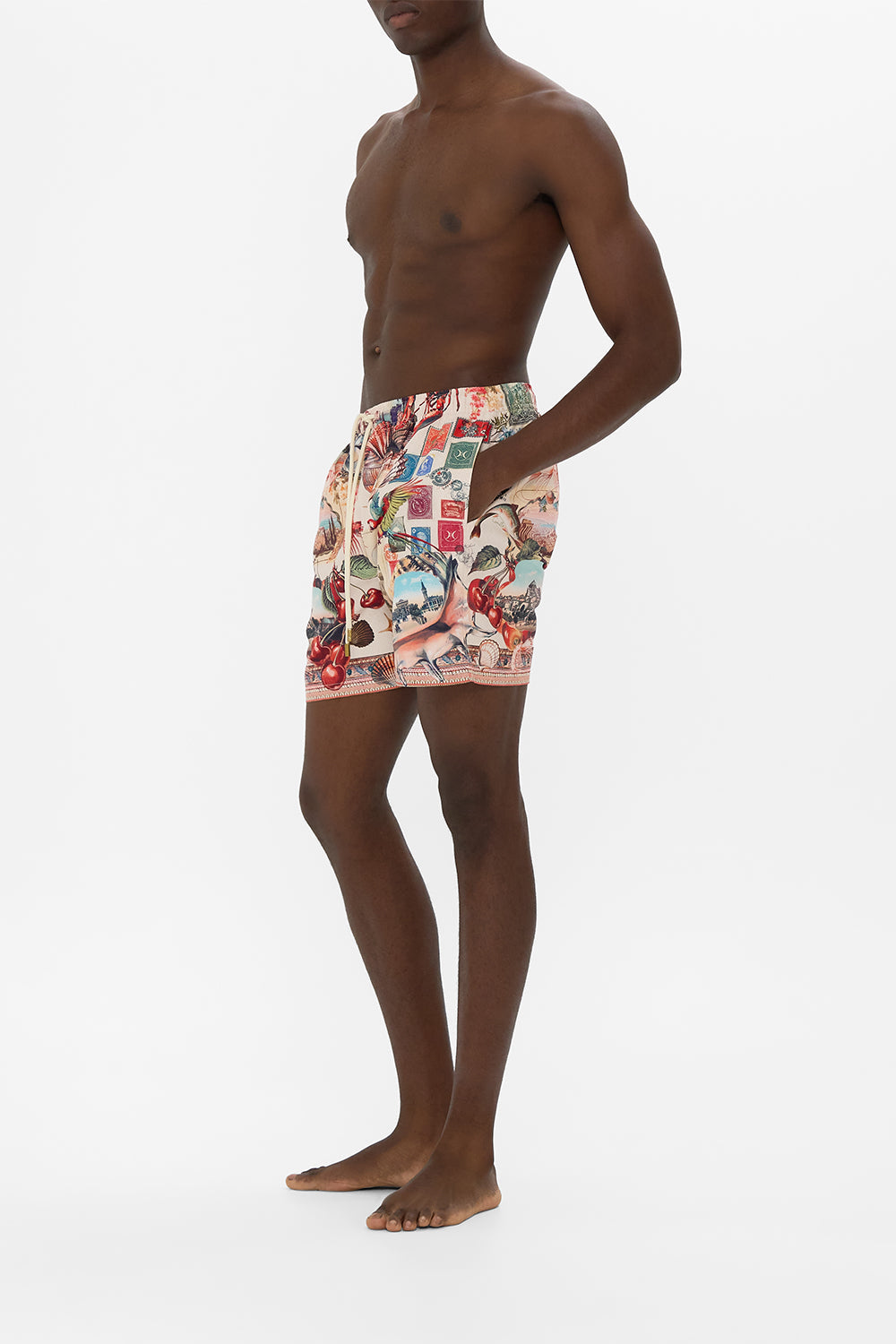 The CAMILLA mid length boardshort with elastic waist from our print notes from the road