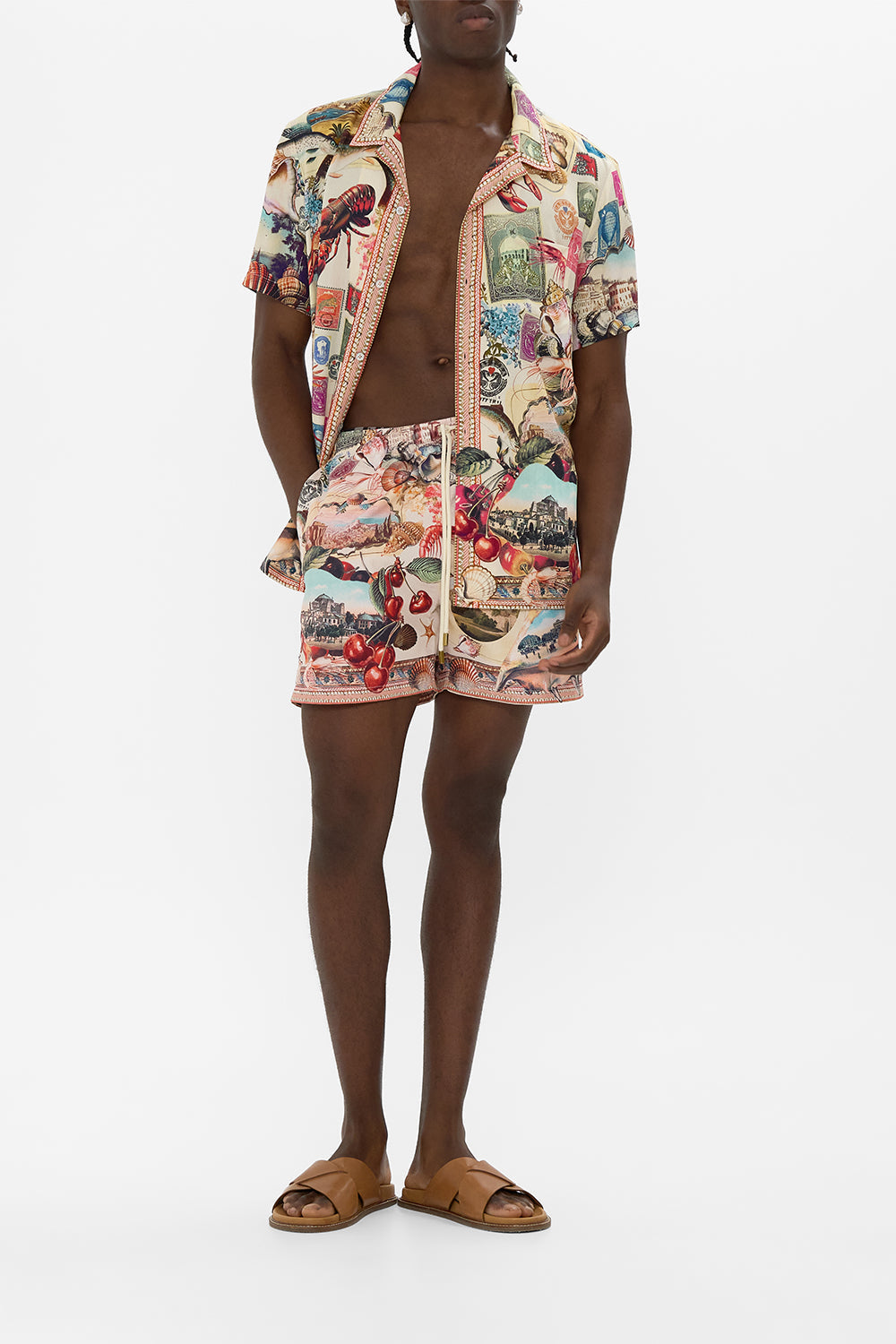 The CAMILLA BUTTON FRONT FRILL DRESS A CERAMIC GARDEN in our  print.
