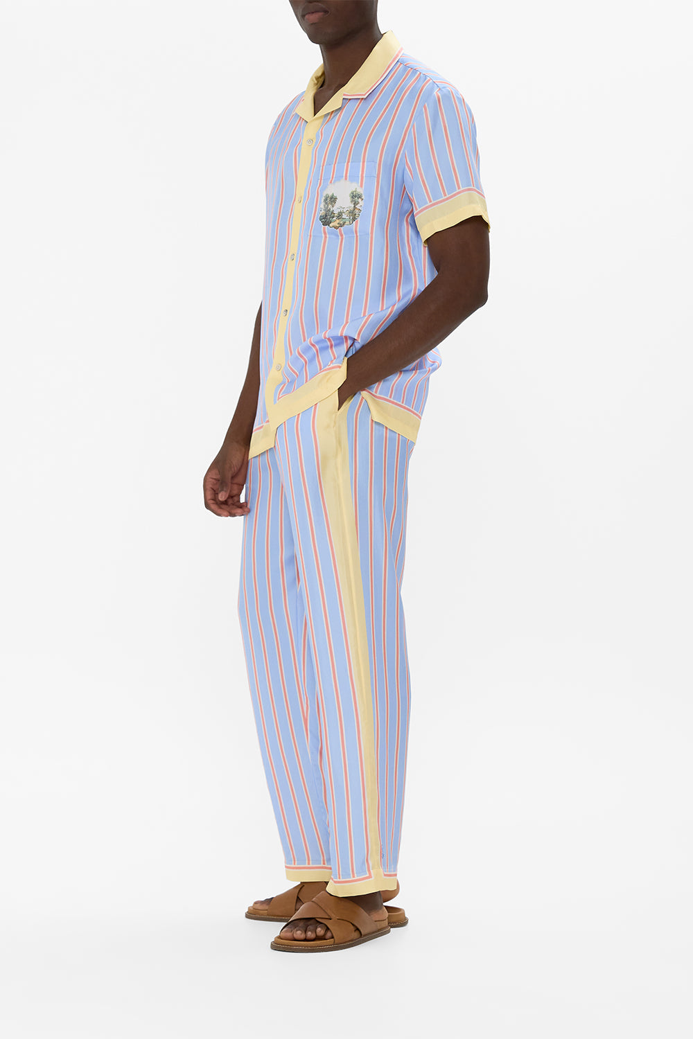 The CAMILLA EYELET WRAP MINI SARONG WITH TIE WAIST ISNIK LULLABY in our  print.