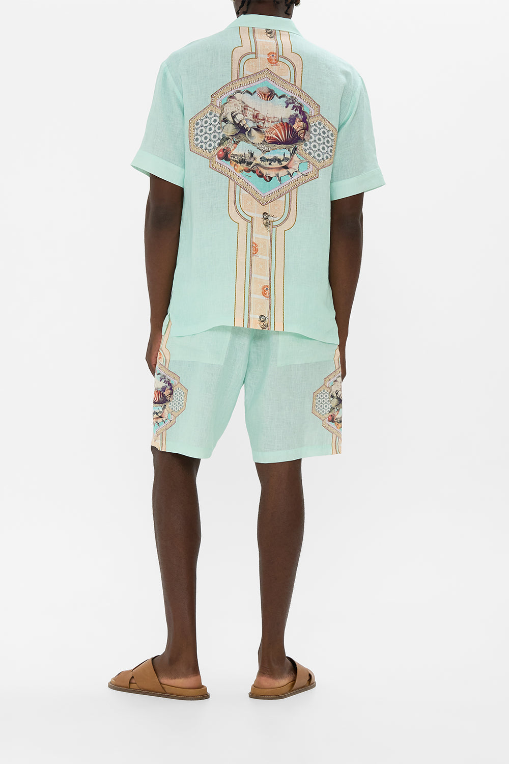 The CAMILLA LONG SLEEVE LONG CAPE THE CONCUBINES CORRIDOR in our  print.