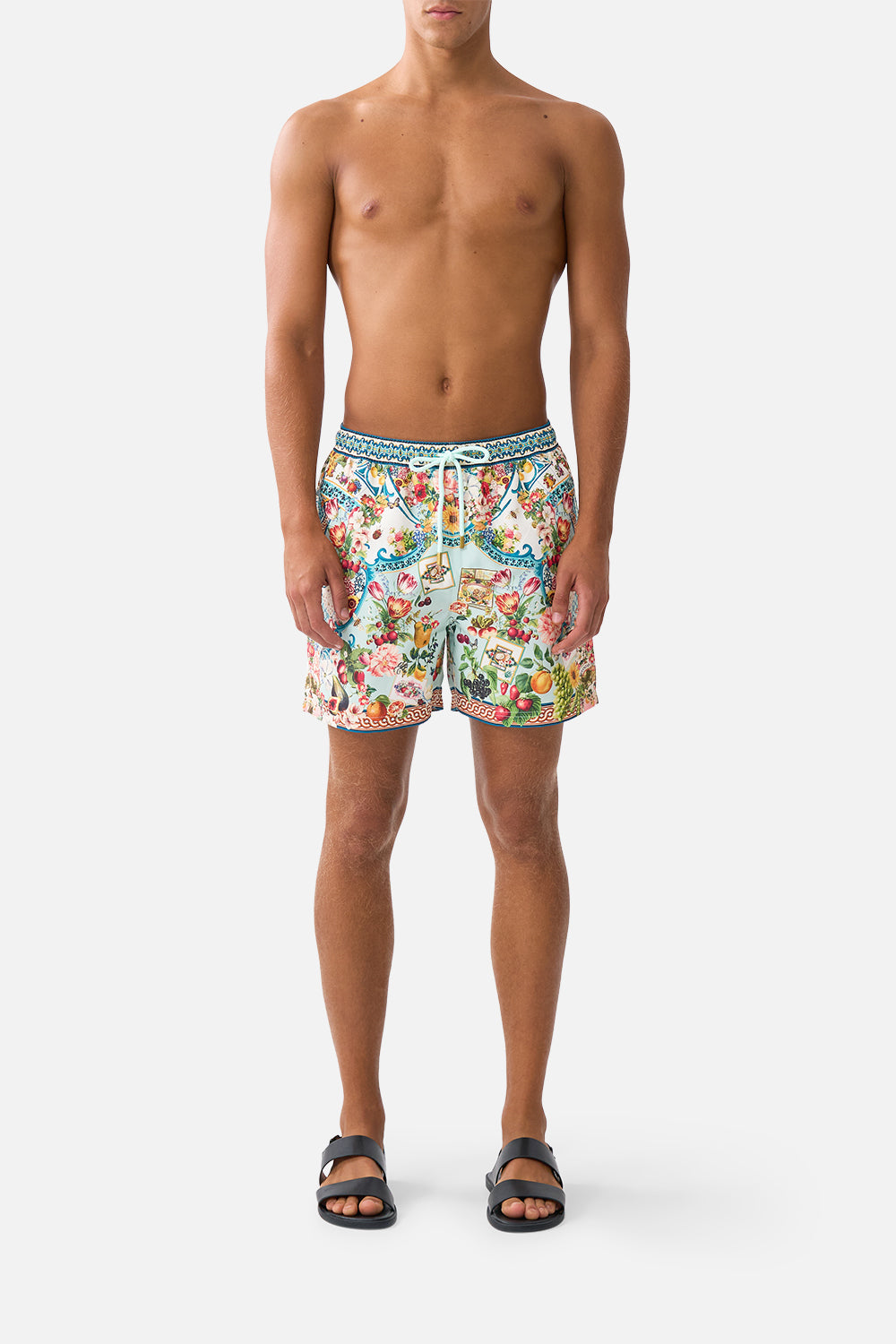 The CAMILLA MID LENGTH BOARDSHORT WITH ELASTIC WAIST ANIMALS IN THE PALACE in our  print.