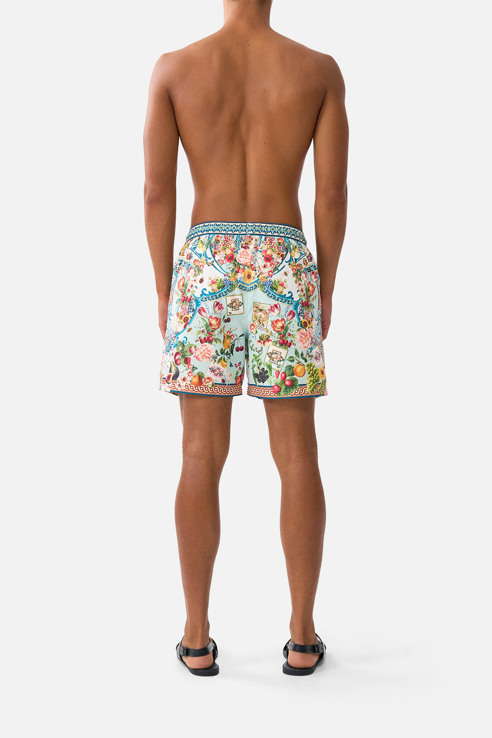 The CAMILLA MID LENGTH BOARDSHORT WITH ELASTIC WAIST ANIMALS IN THE PALACE in our  print.