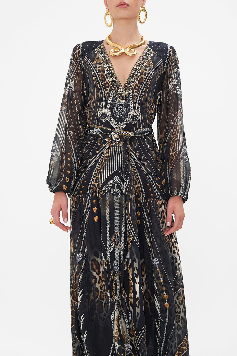 Crop view of model wearing CAMILLA silk maxi dress in Chaos In The Cosmos animal print
