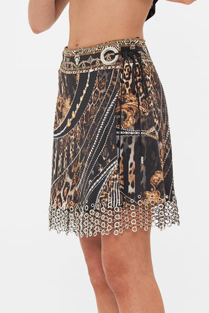 Detail view of model wearing CAMILLA embellished mini skirt in Chaos In The Cosmos animal print