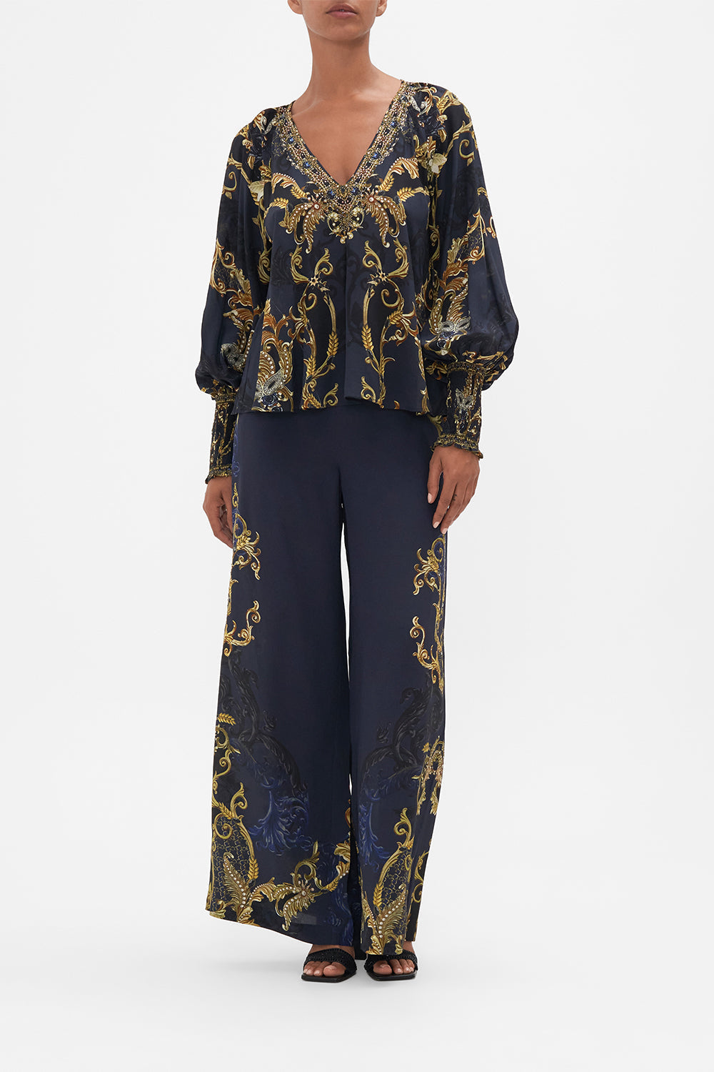 Front view of model wearing CAMILLA navy silk blouse in Moonlight Melodies print