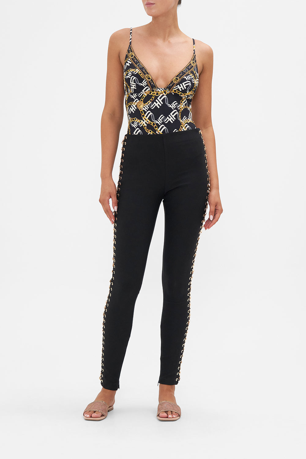 Front view of model wearing CAMILLA black pants in Tether Me Not 