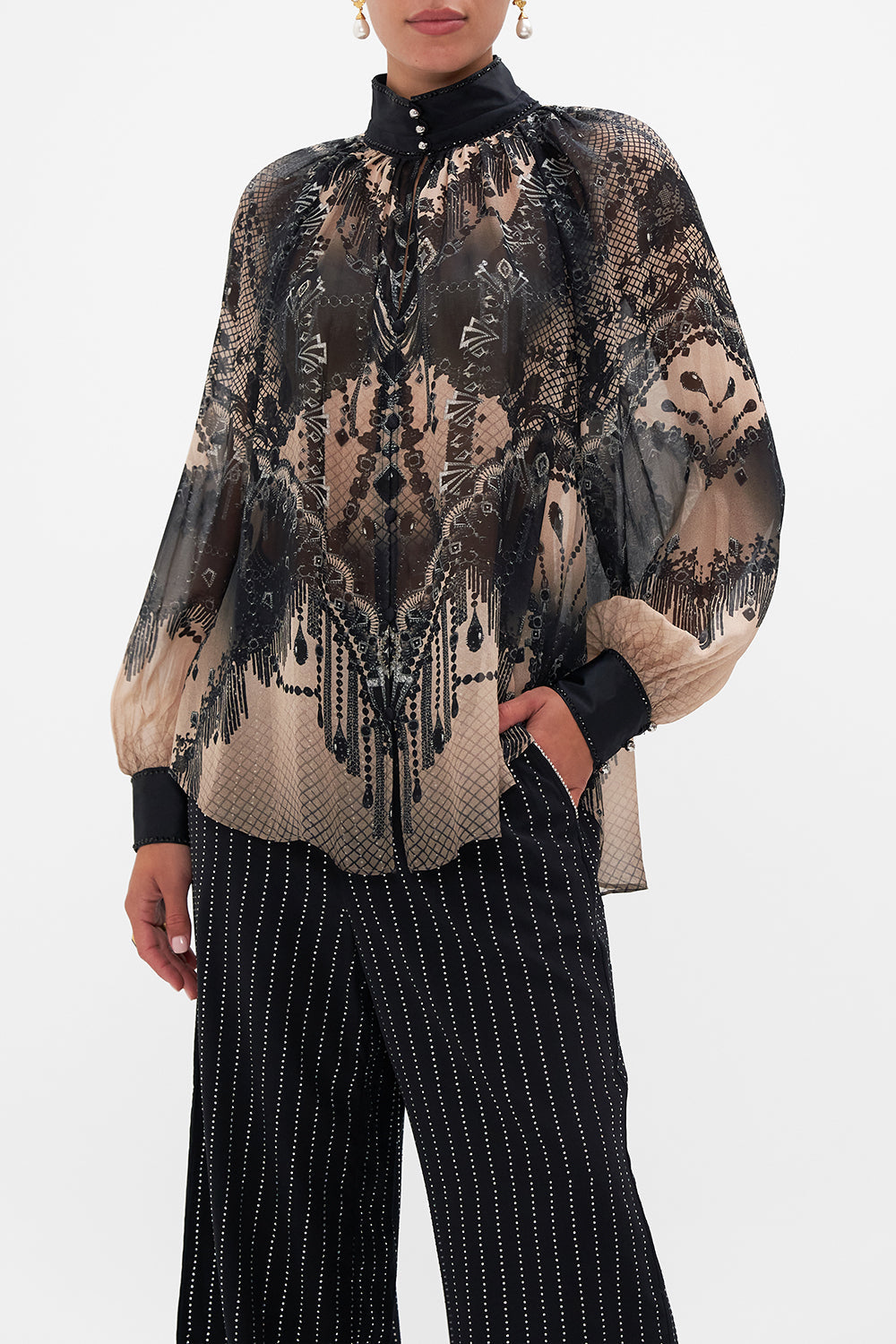 Front view of model wearing CAMILLA silk blouse in Curtain Call Chaos print
