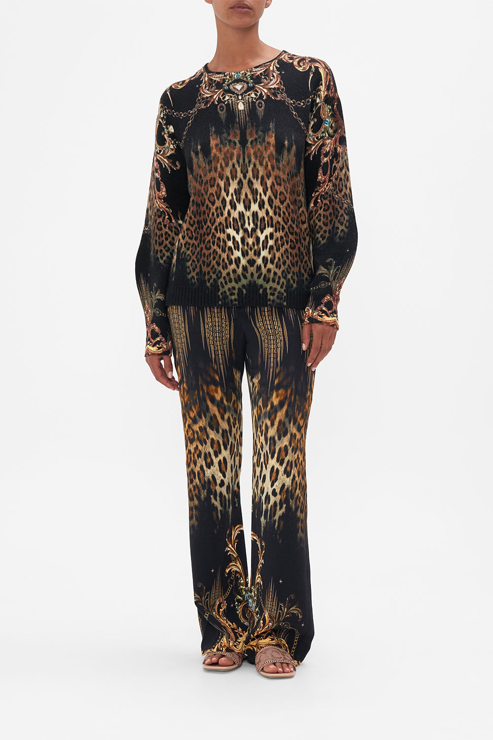Front view of model wearing CAMILLA leopard print wool jumper in Jungle Dreaming print