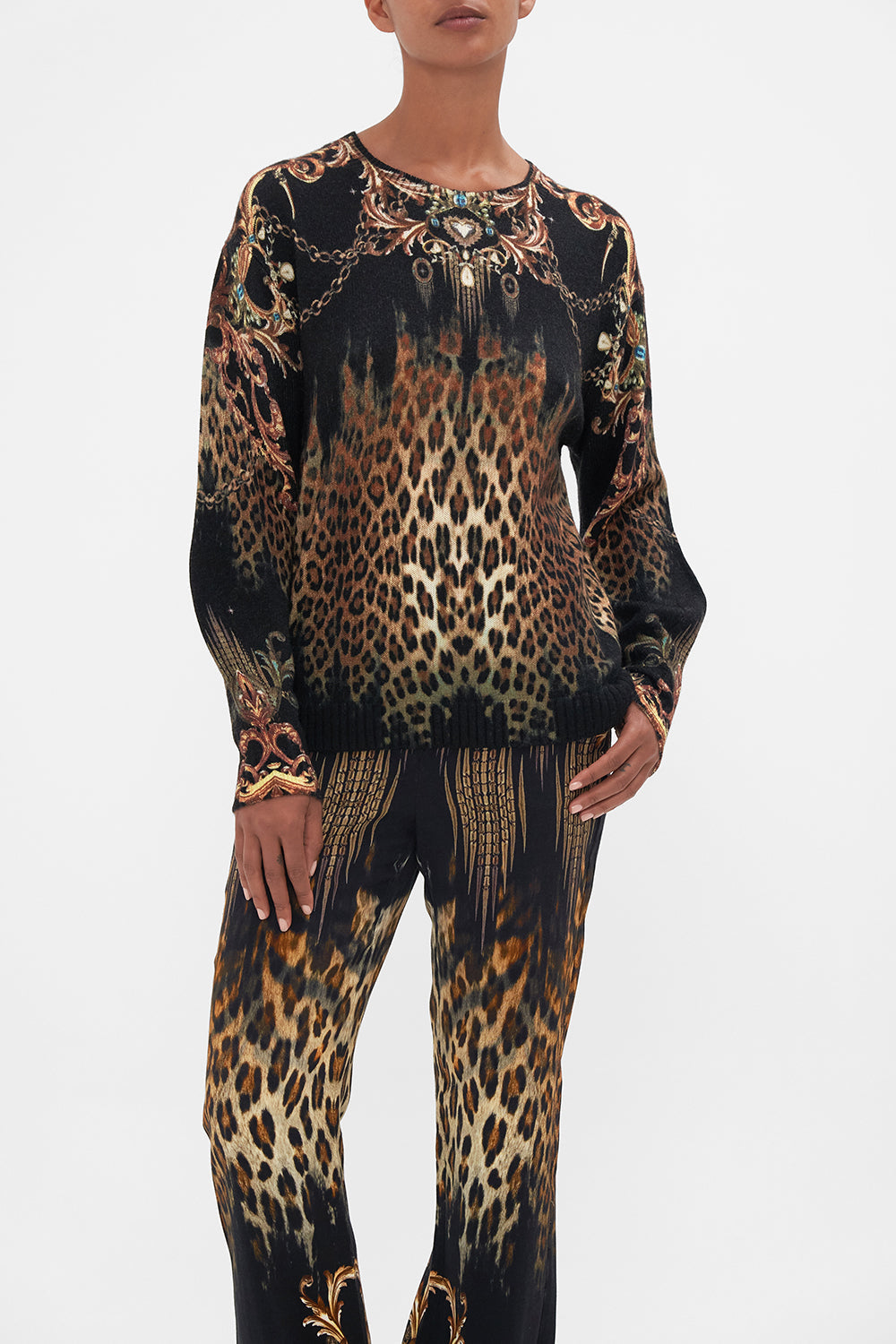 Crop view of model wearing CAMILLA leopard print wool jumper in Jungle Dreaming print