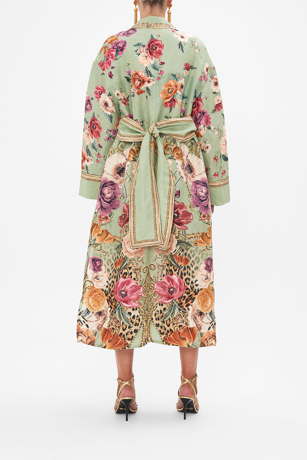 Crop view of model wearing CAMILLA silk linen floral jakcet in Grow and Glow print