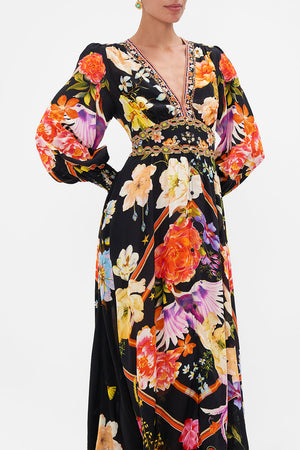 Crop view of model wearing CAMILLA silk maxi dress in Secret History floral print