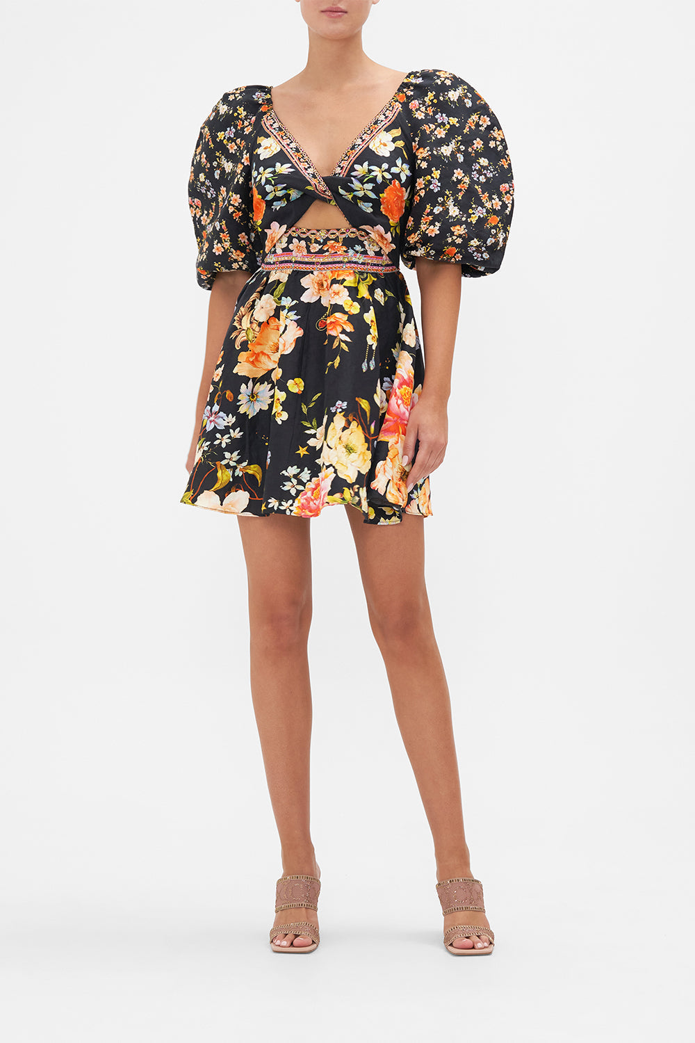 Front view of model wearing CAMILLA floral mini dress in Secret History print