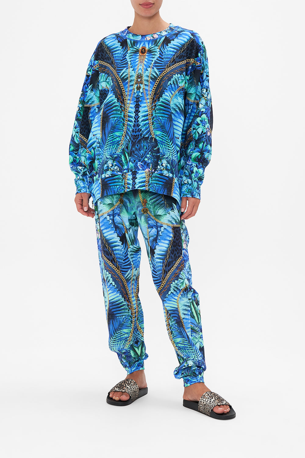 Front view of model wearing CAMILLA oversized sweater in Song Of The Jungle print