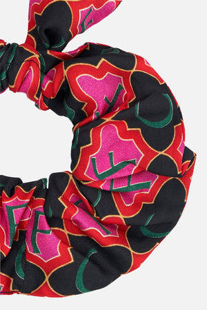 Detail view of CAMILLA silk scrunchie in Jealousy And Jewels print