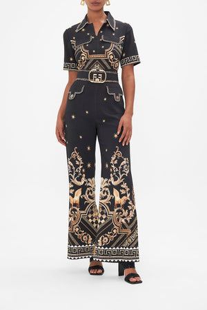Front view of model wearing CAMILLA black jumpsuit in Duomo Dynasty print