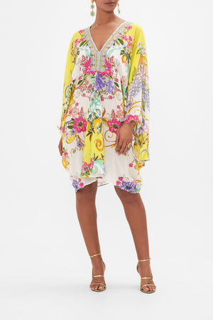Front view of model wearing CAMILLA yellow floral silk kaftan in Caterina Spritz print