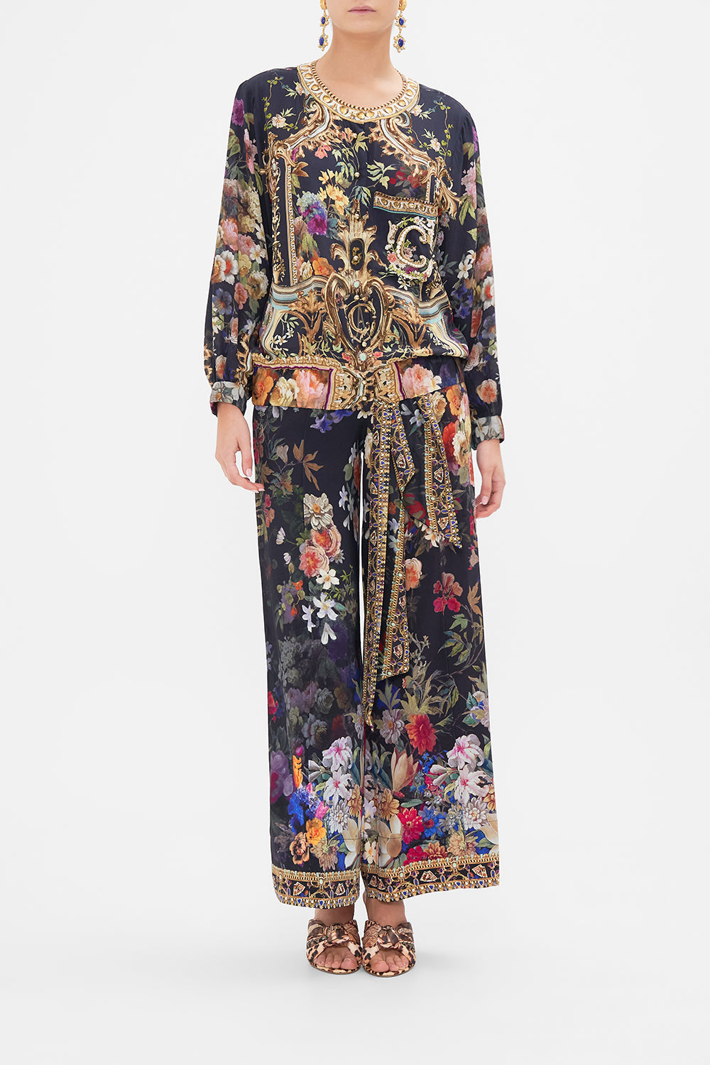 Front view of model wearing CAMILLA silk bomber jacket in Play Your Cards Right print