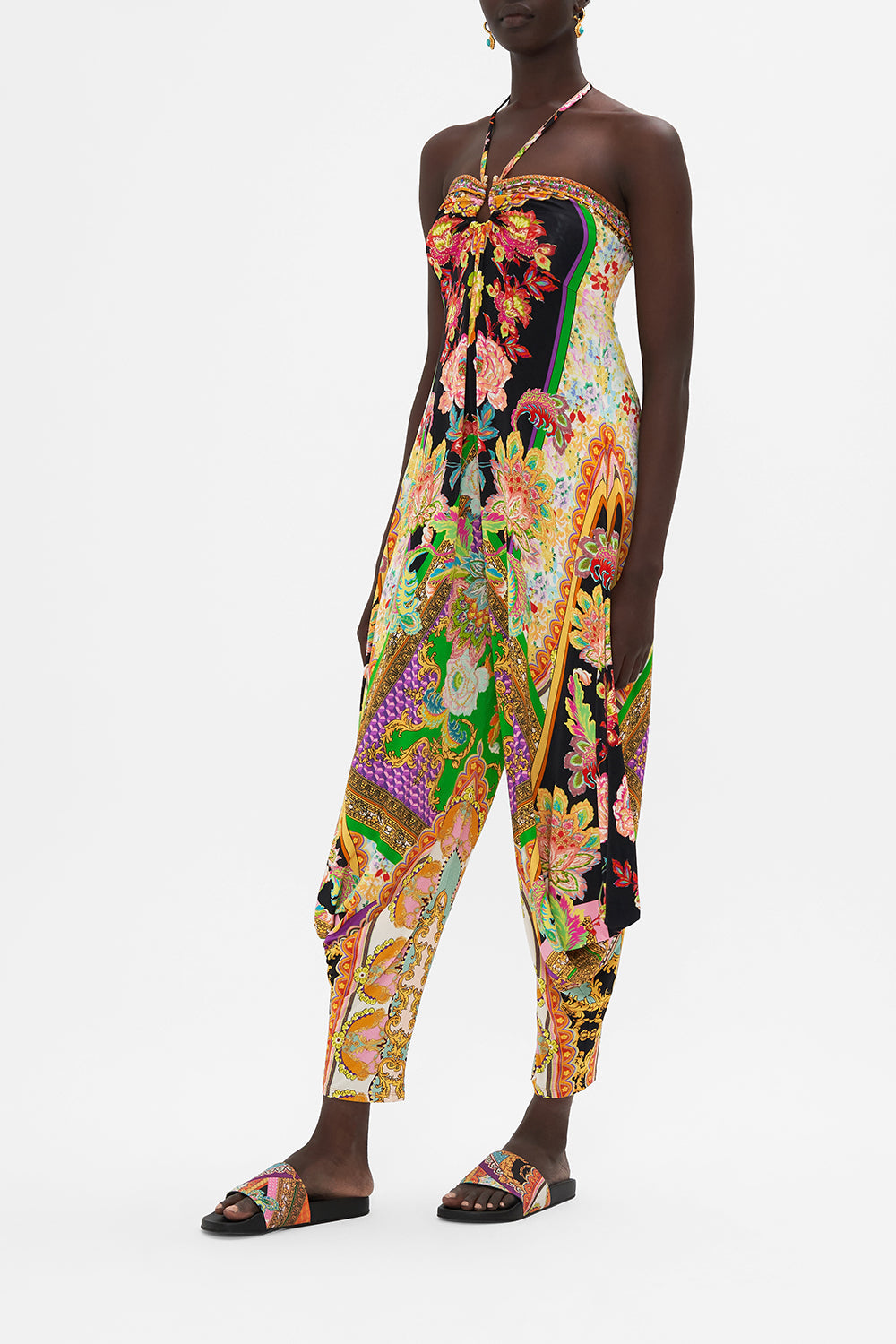 Side view of model wearing CAMILLA printed jumpsuit in Sundowners in Sicily print 