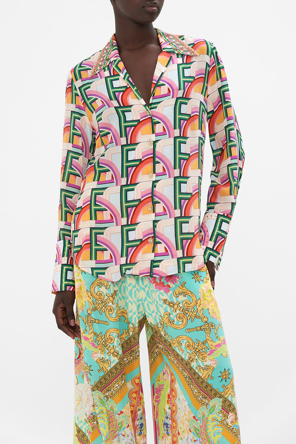 Crop view of model wearing CAMILLA printed silk shirt in An Italian Welcome print