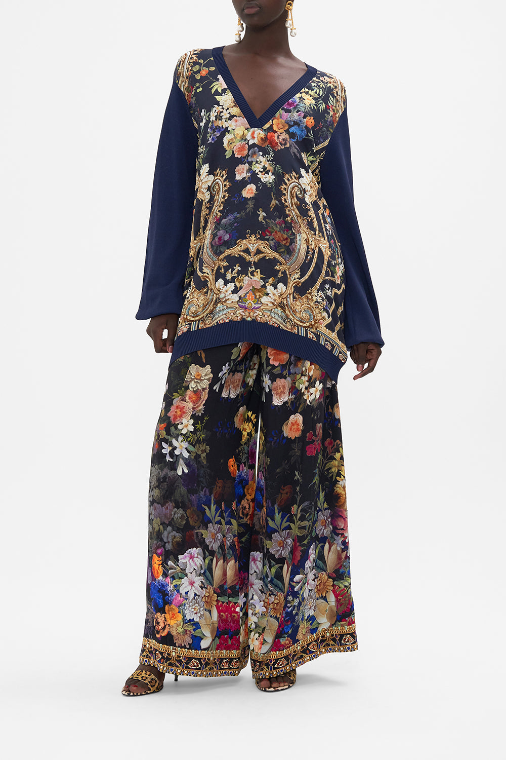 Front view of model wearing CAMILLA v neck jumper in Play Your Cards Right print