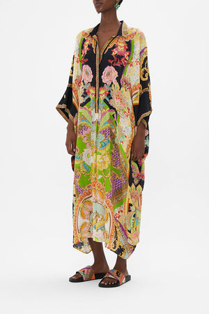 Side view of model wearing CAMILLA printed silk kaftan in Sundowners in Sicily print