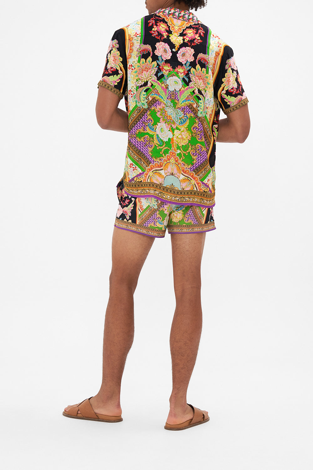 Back view of model wearing Hotel Franks by CAMILLA mens short sleeve camp collared shirt in Sundowners in Sicily print