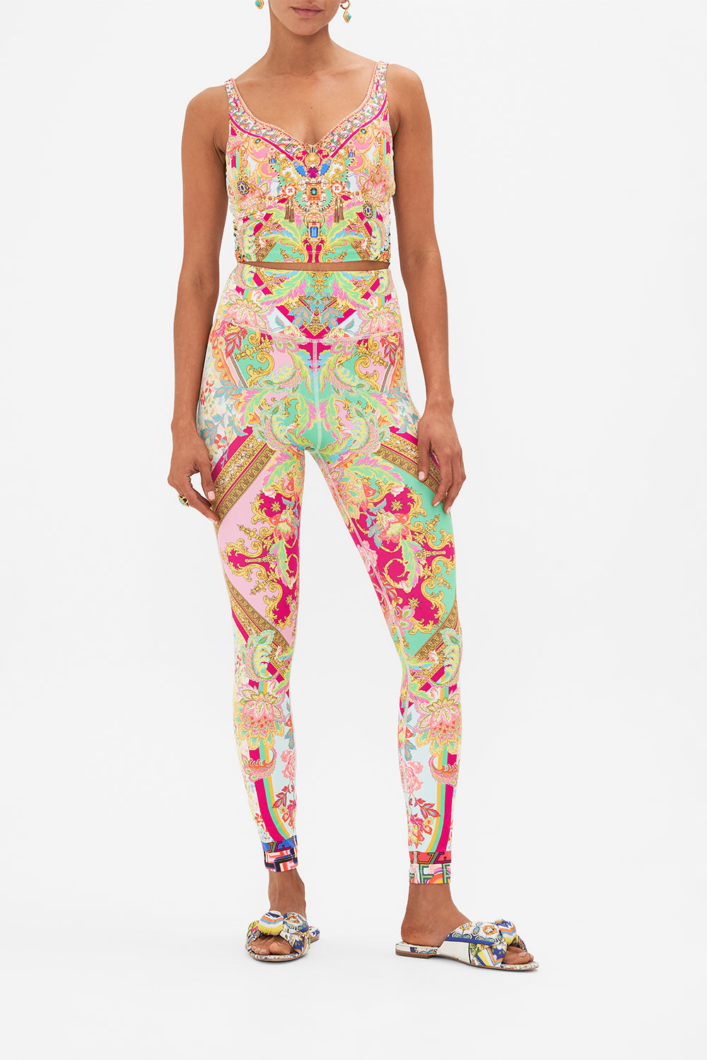 Front view of model wearing CAMILLA printed activewear crop tank in Ciao Bella print