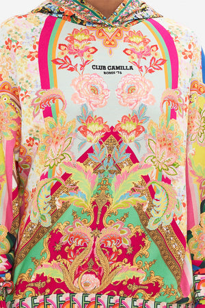 Detail view of model wearing  CAMILLA sweater in Ciao Bella print