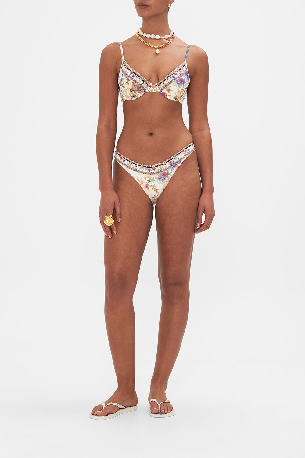 Front view of model wearing CAMILLA floral bikini bottom in Friends With Frescos print