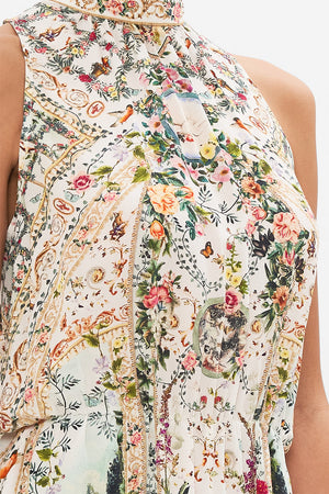 Detail of model wearing Milla By CAMILLA silk playsuit in Renaissance Romance print