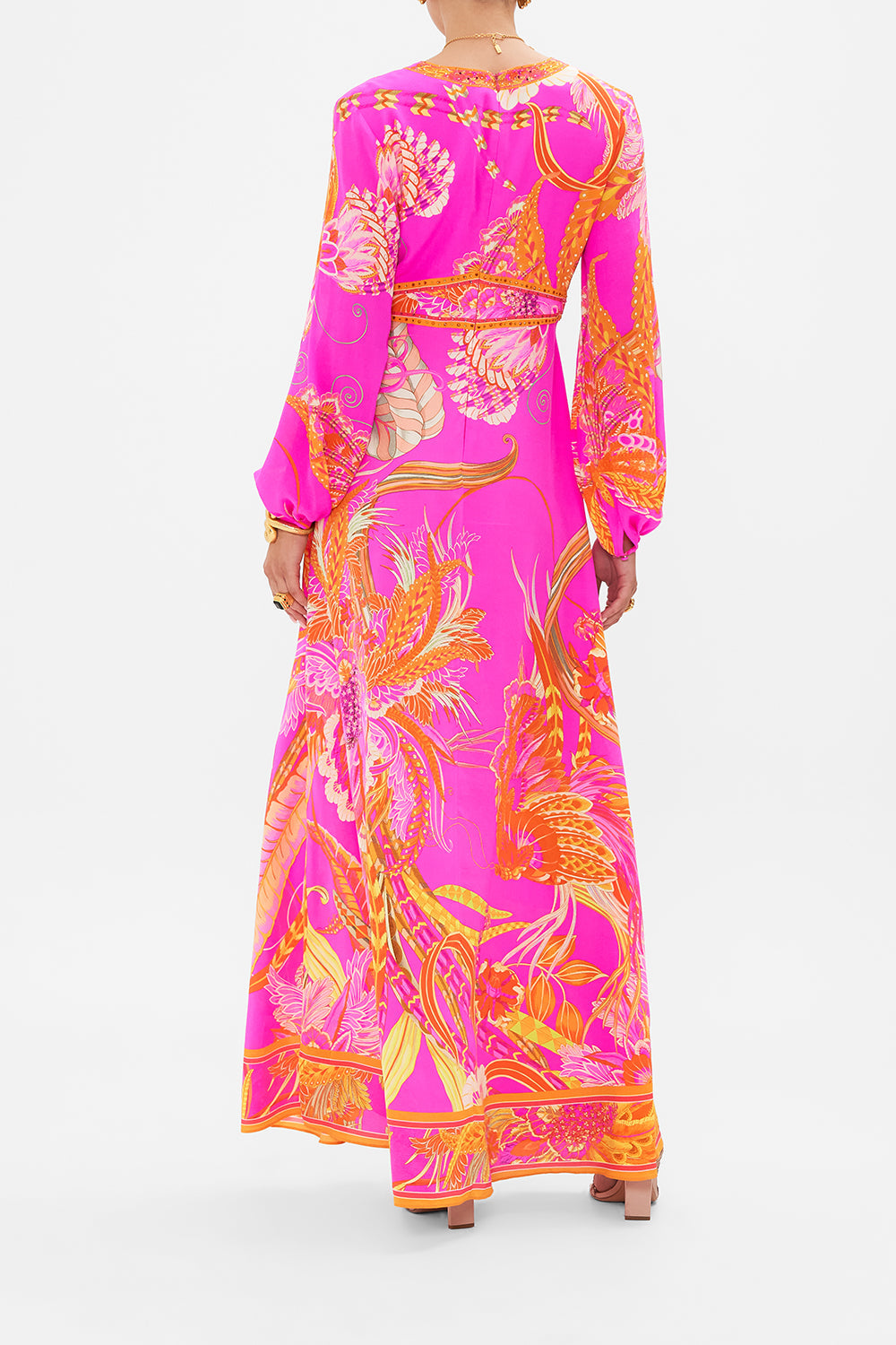 Back view of model wearing CAMILLA pink silk dress in A Heart That Flutters print