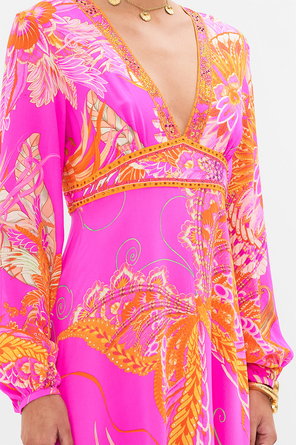 Detail view of model wearing CAMILLA pink silk dress in A Heart That Flutters print
