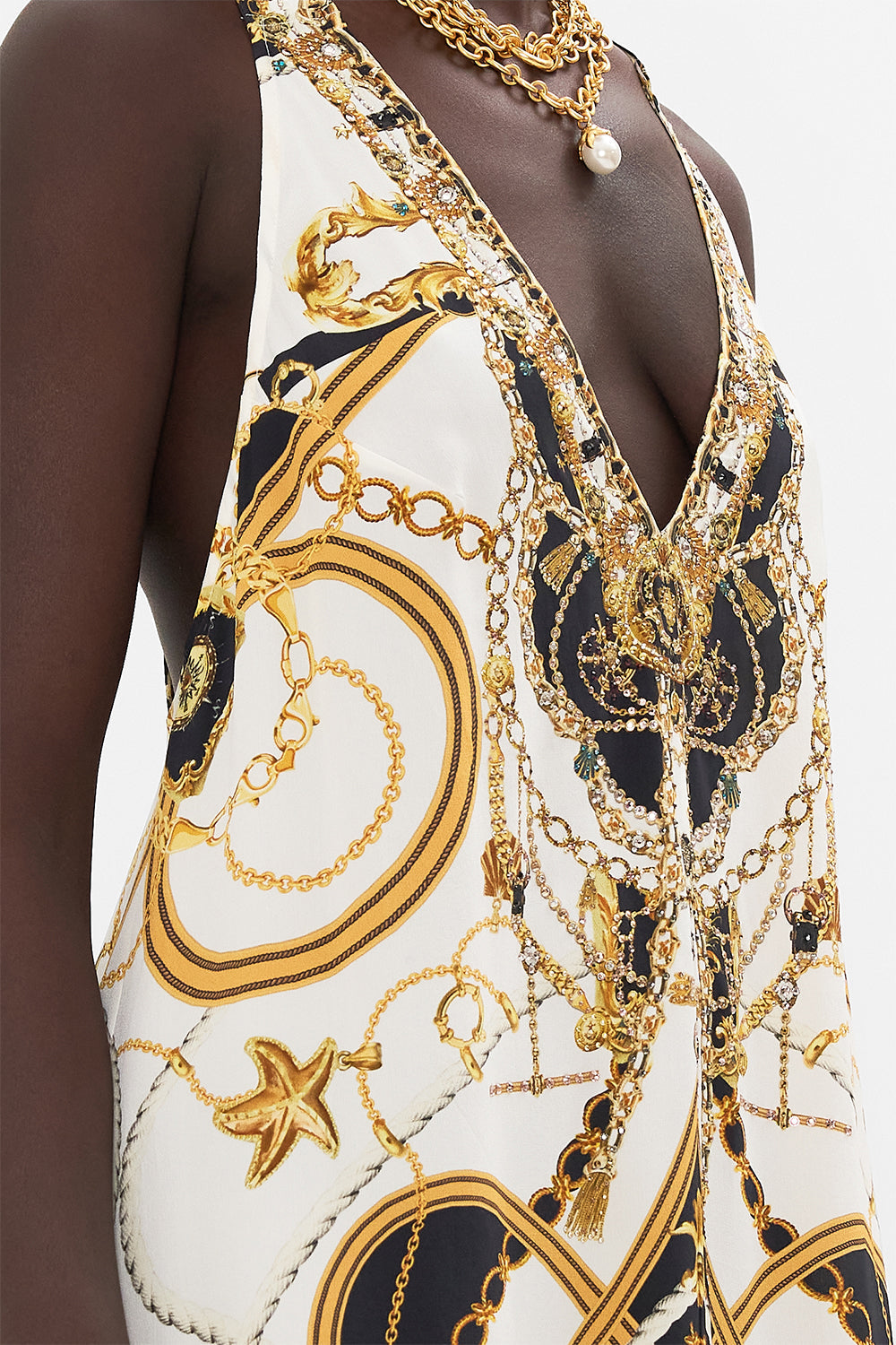 Detail view of model wearing CAMILLA reacerback dress in Sea Charm print