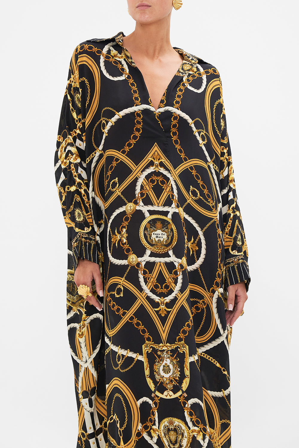 Crop view of model wearing CAMILLA silk kaftan in Coast to Coast print