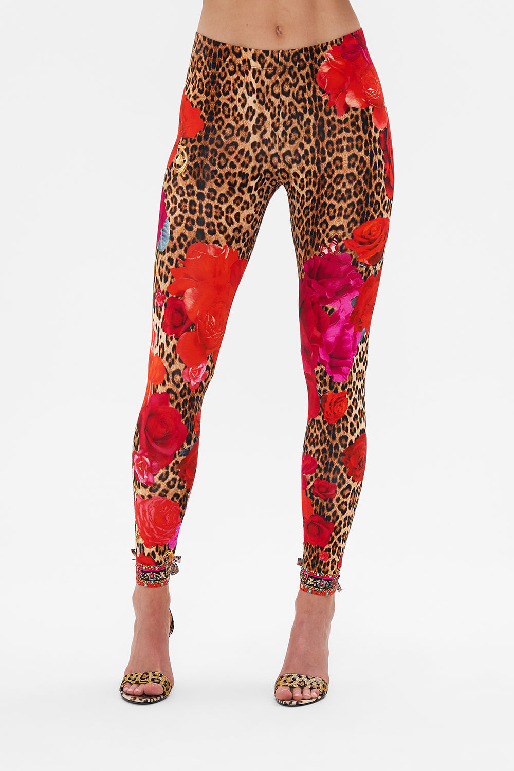 Crop view of model wearing CAMILLA designer leggings in Heart Like A Wildflower print 