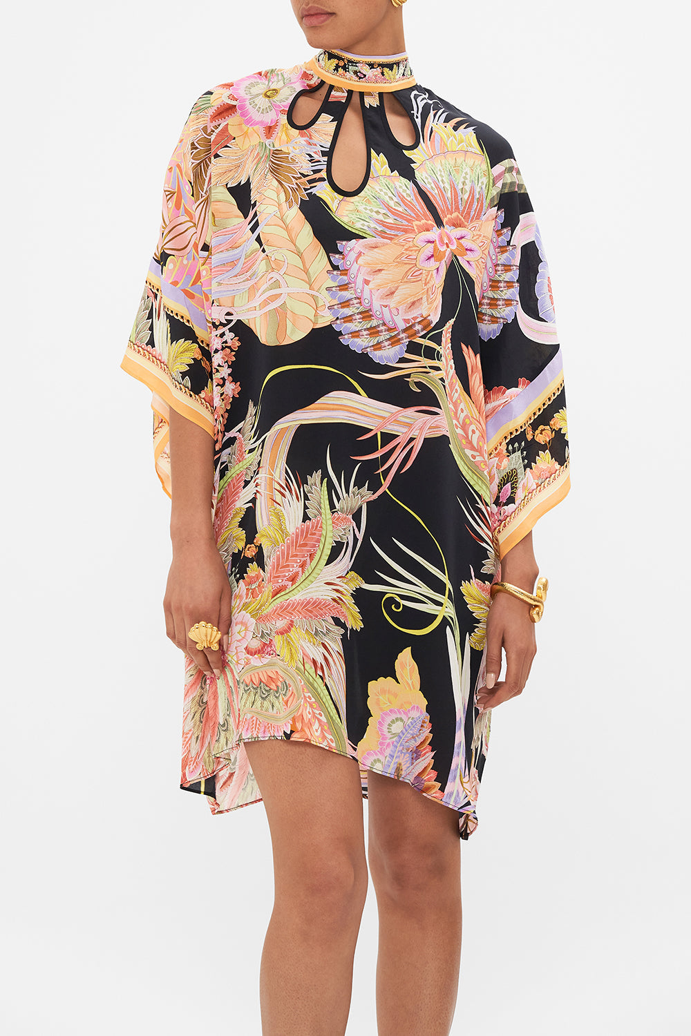 Crop view of model wearing CAMILLA silk kaftan in Lady of The Moon print