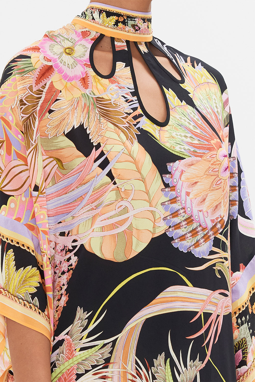 Detail view of model wearing CAMILLA silk kaftan in Lady of The Moon print