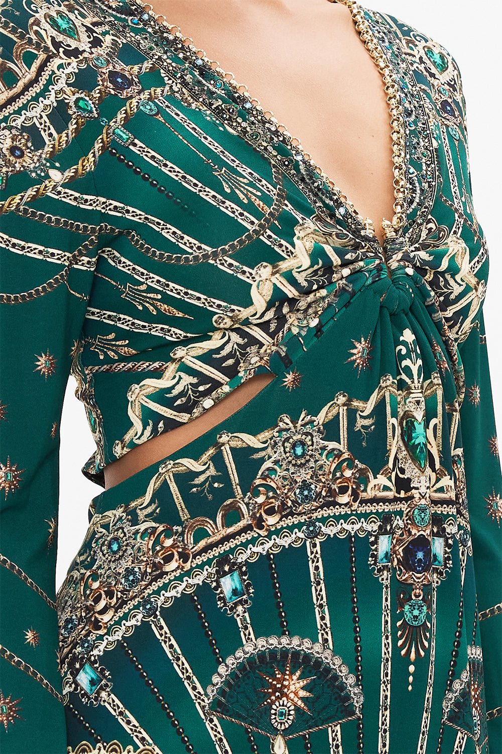 Detail view of model wearing CAMILLA cut out green jersey dress in A Venice Veil print