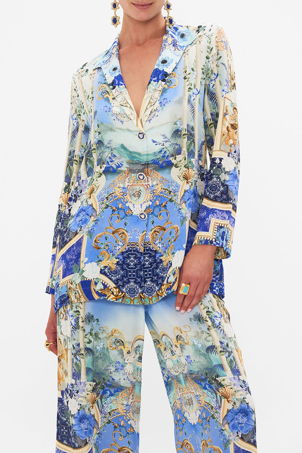 Crop view of model wearing CAMILLA silk jacket in Views Of Vesuvius print