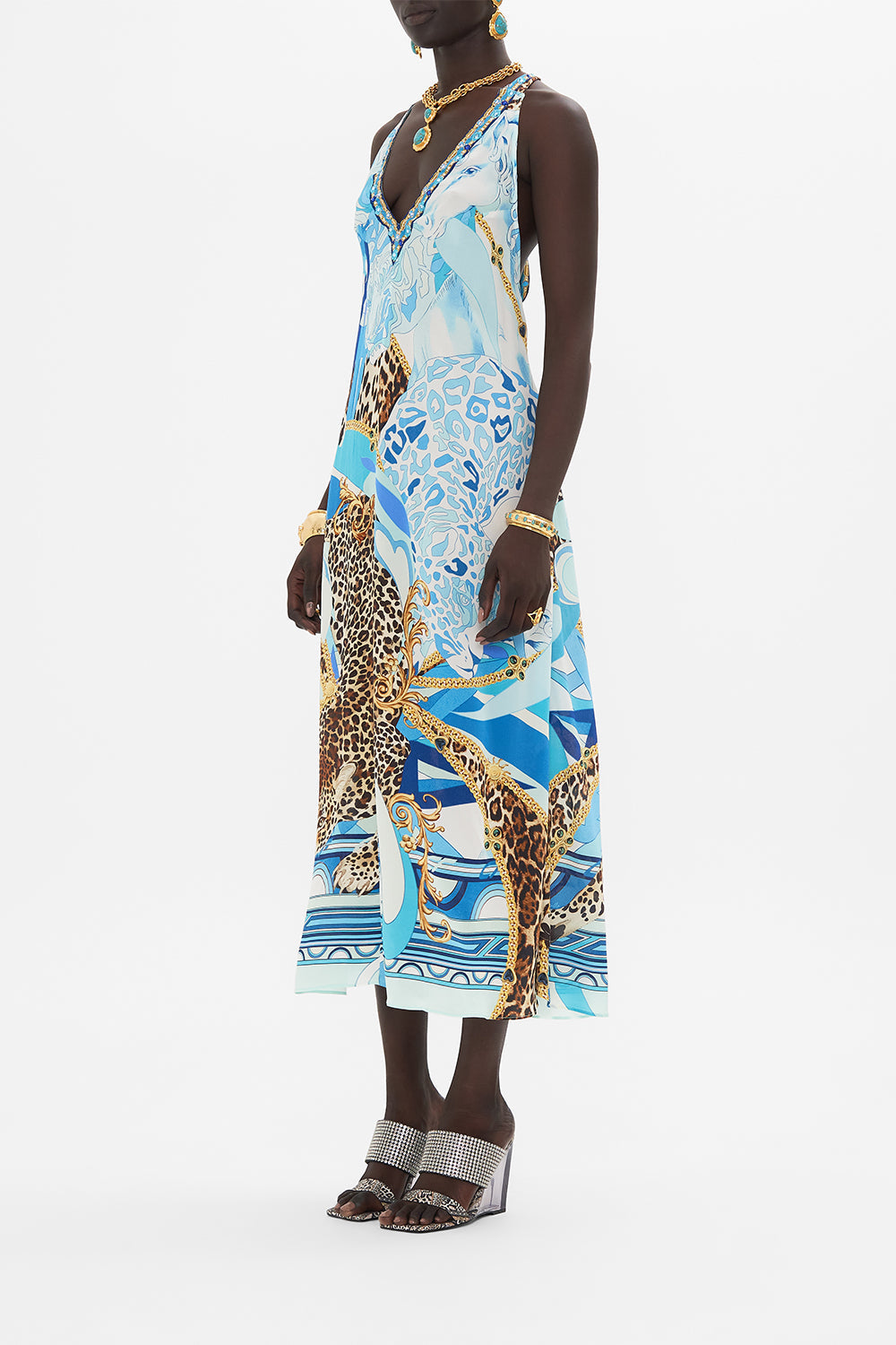 Side view of model wearing CAMILLA silk dress in Sky Cheetah print 