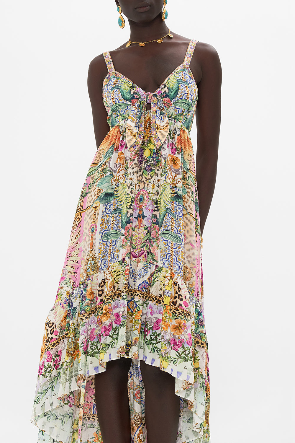 Crop view of model wearing CAMILLA floral silk dress in Flowers Of Neptune print