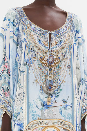 Detail view of model wearing CAMILLA silk blouse in Season Of the Siren print