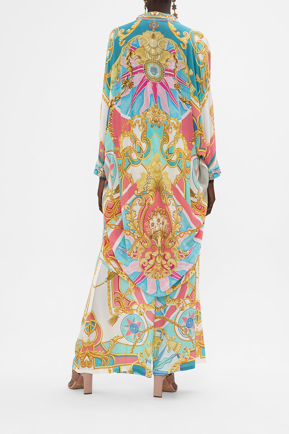 Back view of model wearing CAMILLA drape back top in Sail Away With me print 