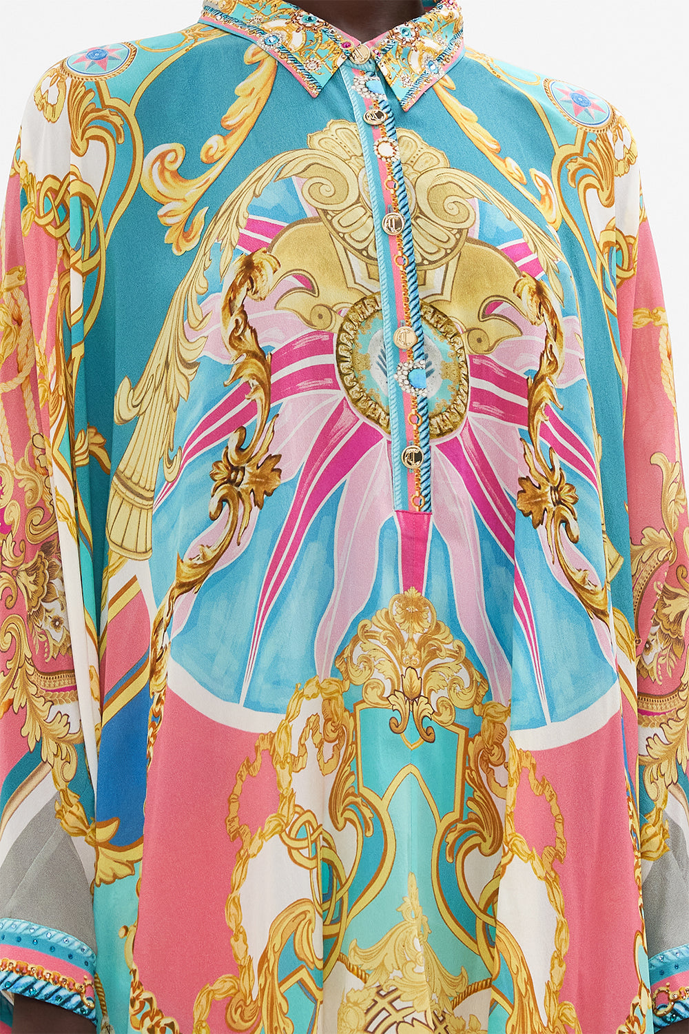 Detail view of model wearing CAMILLA drape back top in Sail Away With me print 