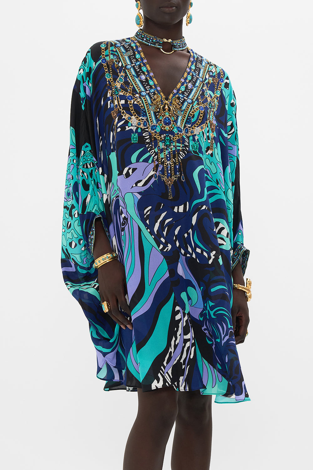 Crop view of model wearing CAMILLA silkmini dress in Vividly Venice print 