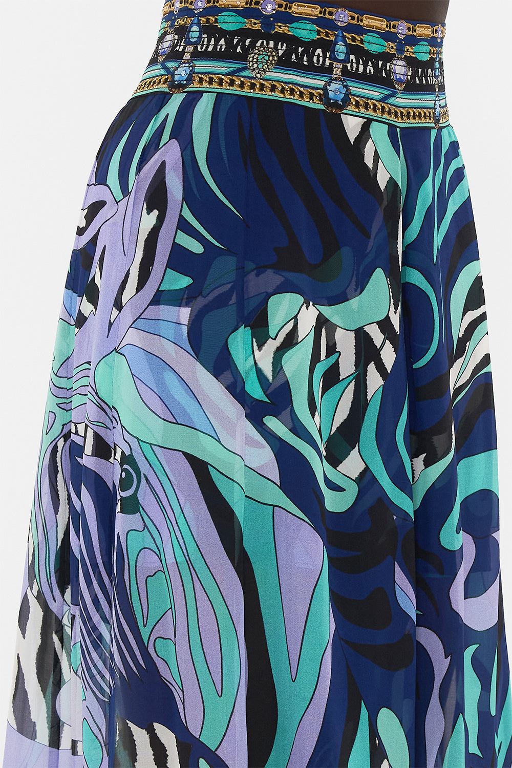 Detail view of model wearing CAMILLA sheer silk palazzo pants in Vividly Venice print 