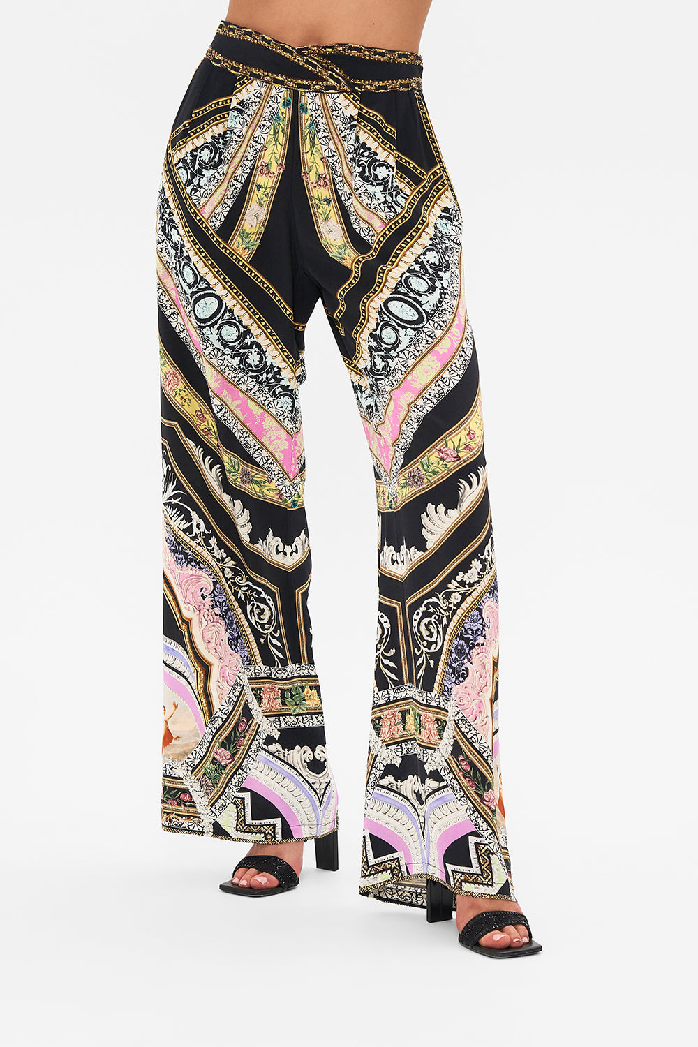 Detail view of model wearing CAMILLA flared pant in Florence Field Day print 