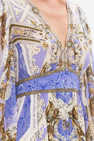 Detail view of model wearing CAMILLA silk maxi dress in Guilded Pleasures print